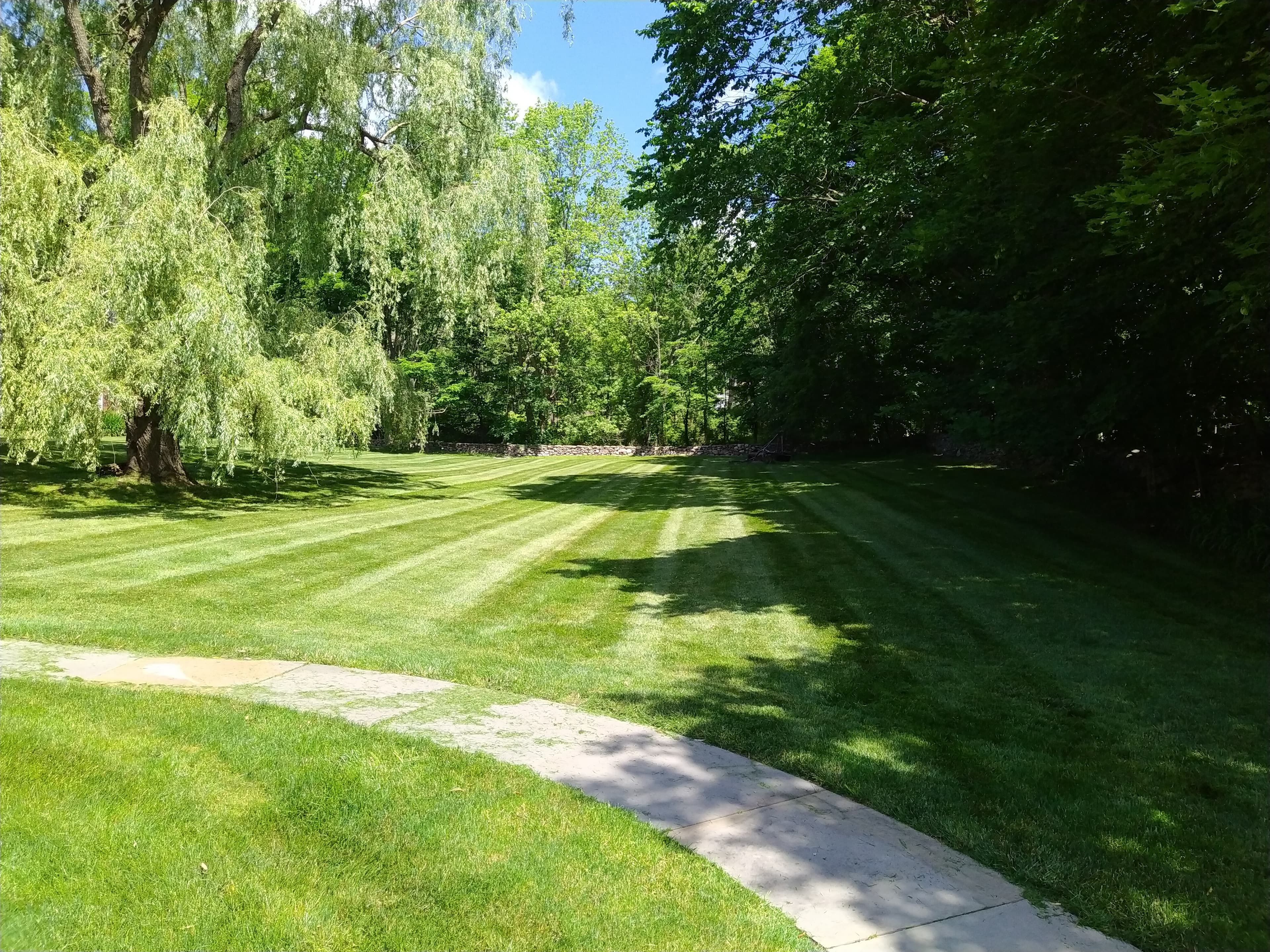 Striped lawn and property maintenance.